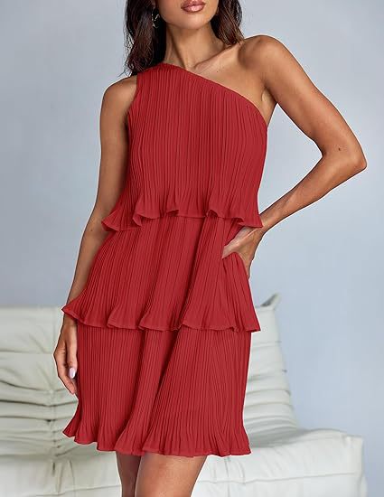 Red one-shoulder dress worn by a model against a neutral background